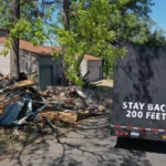 tornado debris pickup image showing truck and debris