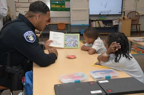 photo of officer reading to students