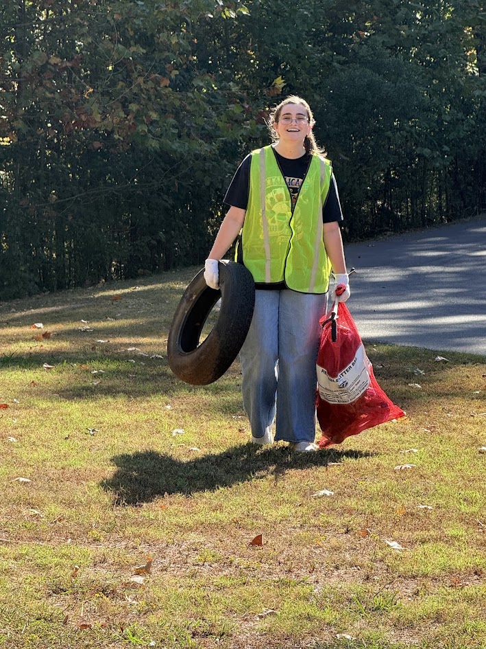 students cleaning creek